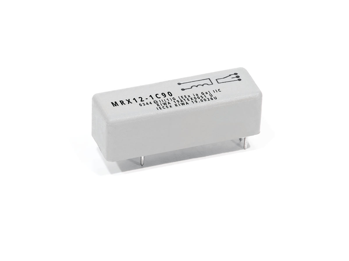 A rectangular MRX Series electronic component, likely a reed relay, labeled MRX12-1C90 with technical details and a pin diagram on its top surface. The component features four metal pins at the bottom. by Standex Detect