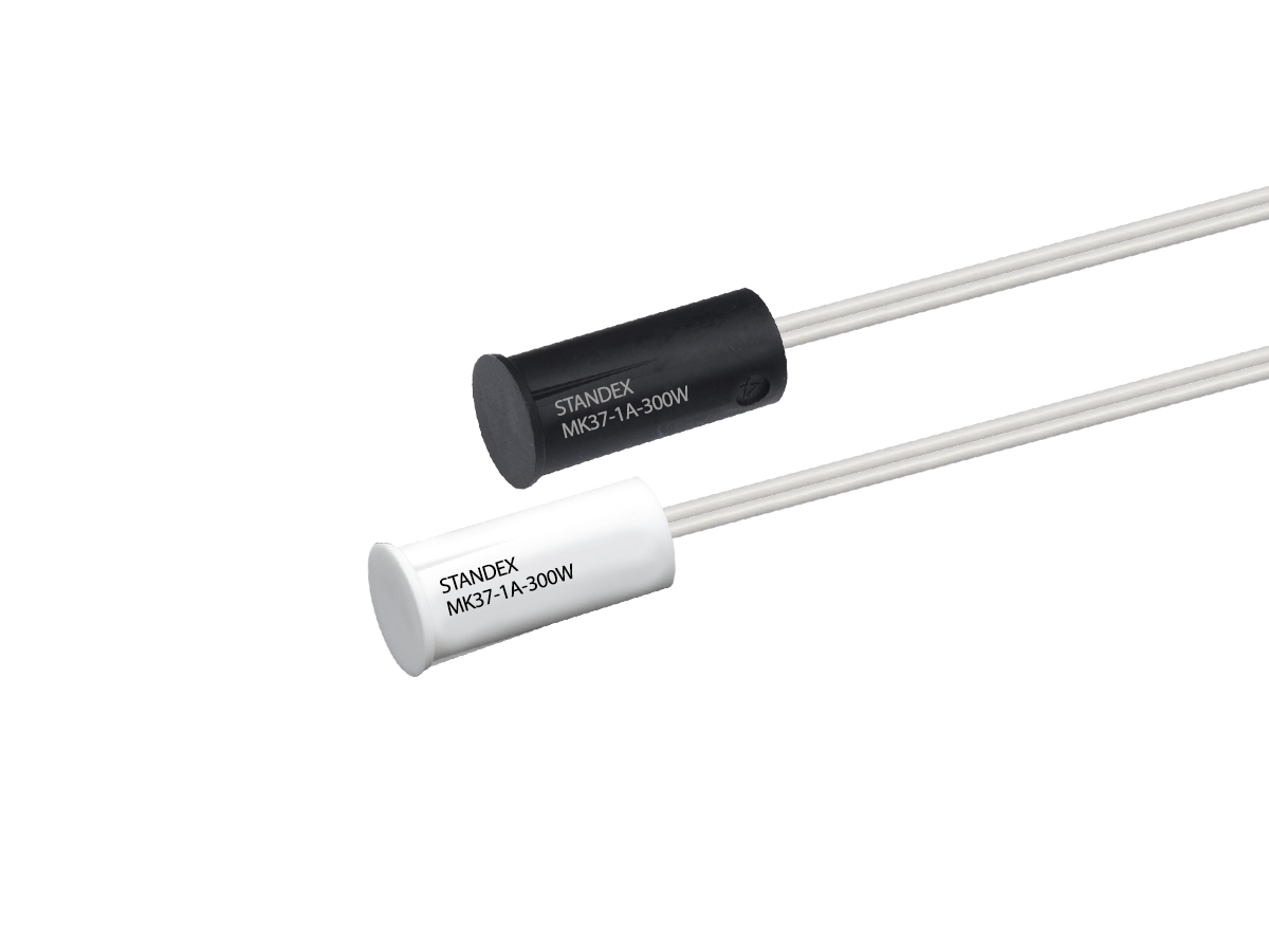The MK37 Series Reed Sensor is a recessed magnetic sensor that is designed for installation in a ø3/8” hole or in a ø3/4” hole when using an adapter. The sensor is designed for a press fit installation that utilizes crush ribs to retain the sensor in the installation hole as well as a mating magnet to match.